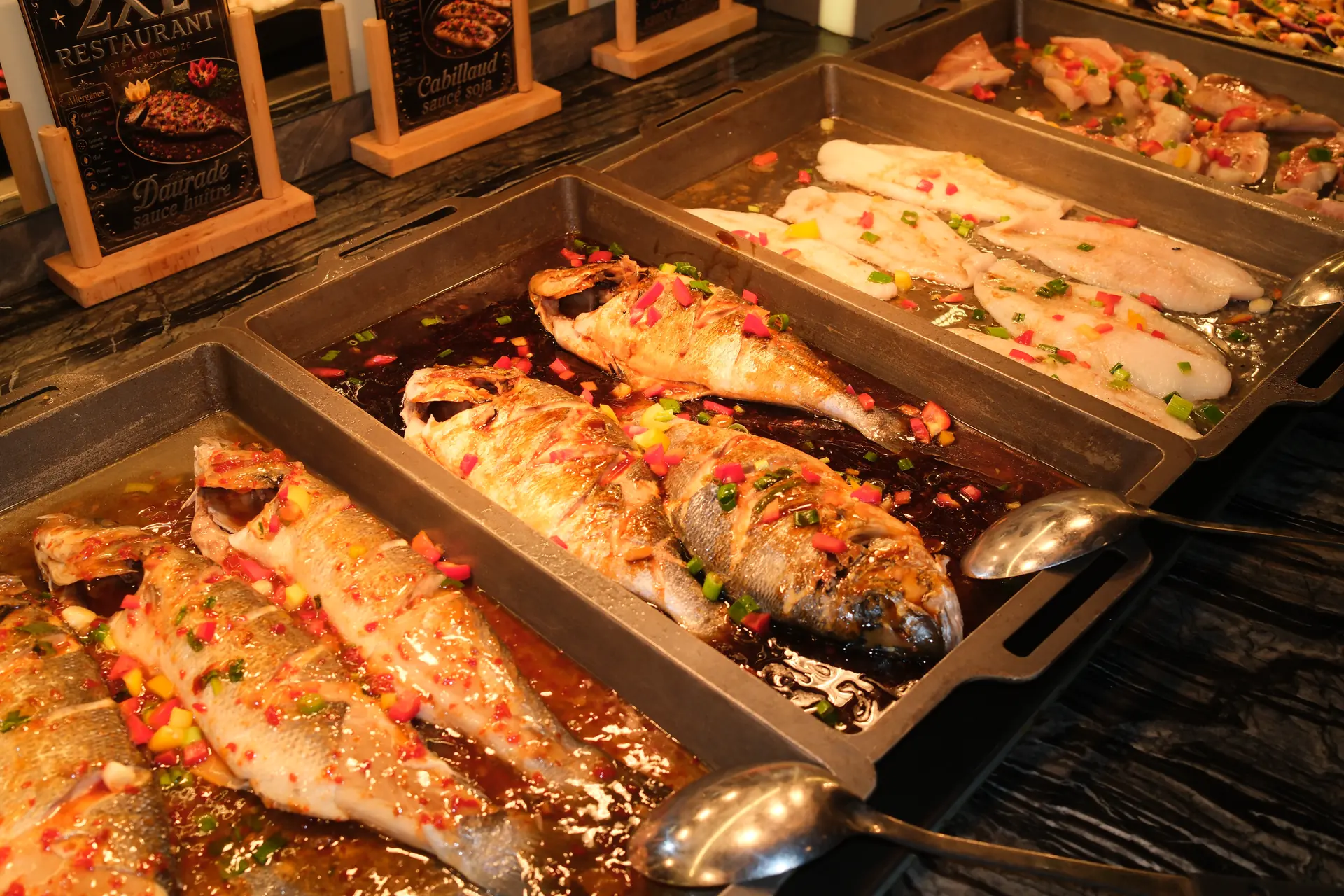 Poissons mijotés en sauce